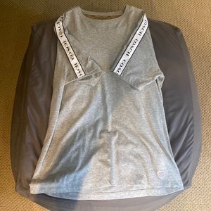 Coach T-shirt with “Coach” branded stipe down sleeves.